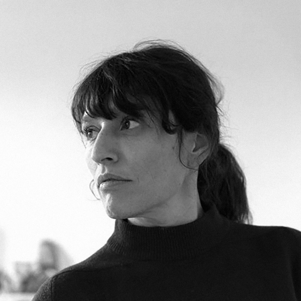Portrait of Eli Cortiñas.